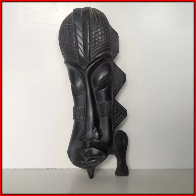 Antica scultura in legno d'ebano, arte africana volto intagliato circa trenta cm