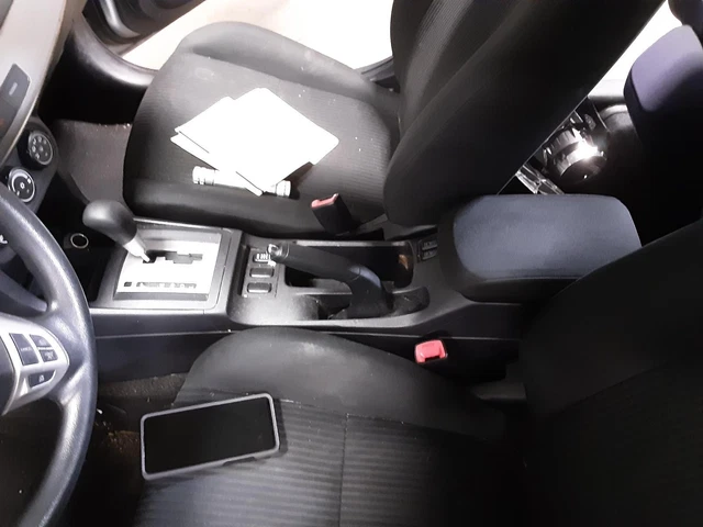 Used Front Lower Center Console fits: 2014 Mitsubishi Lancer floor w/armrest Fro