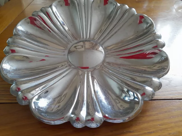 Round Chrome serving dish approx 26 cms across sun ray design