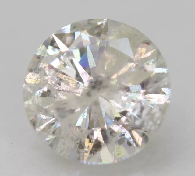 Certified 0.79 Carat G Color Round Brilliant Enhanced Natural Diamond 5.92mm
