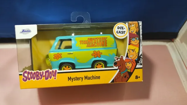 https://www.picclickimg.com/wU8AAOSwHDtlY9aM/Scooby-Doo-Mystery-Machine-Van-Diecast-132-Scale-Hollywood.webp
