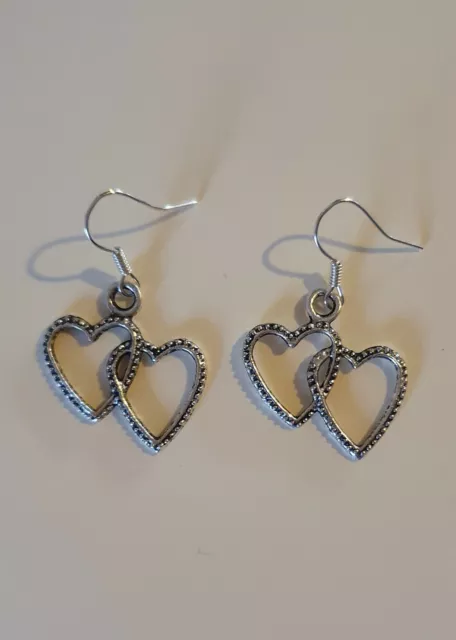 Silver style double heart dangly earrings on silver plated hooks - hand made