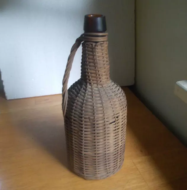 1890s WICKER COVERED AMBER HAND BLOWN WHISKEY BOTTLE WITH WICKER HANDLE NICE!