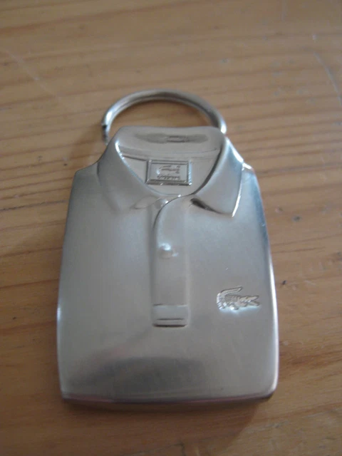 Polo lacoste sales crocodile gris