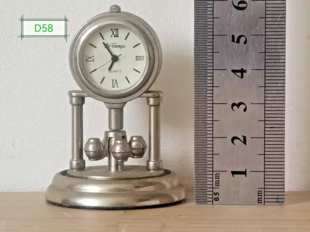 Mini horloge à poser, métal, argenté, balancier rotatif, déco, vintage.