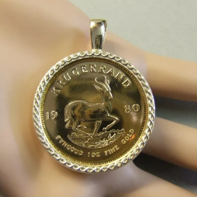 18ct gold New pendant that will fit a one Oz fine gold krugerrand bullion coin