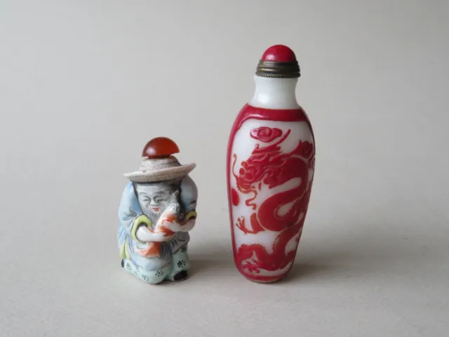 2 Vintage Chinese Snuff Bottles -- Porcelain Man & Fish - Glass Dragon & Phoenix