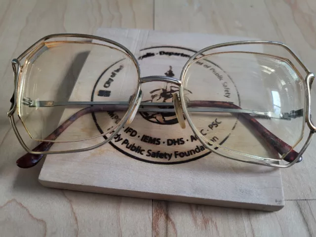Vintage LUXOTTICA Andromeda Women's Eyeglass Floating Frame silver