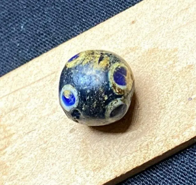 An ancient amulet of wealth, Viking ceramic bead is a very rare artifact.