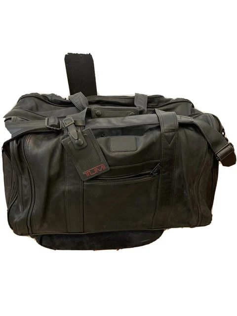TUMI black genuine Leather Carry-On Weekender Duffle Bag expandable used