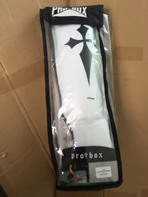 pro box shin pads in white, size ‘junior’ for kick boxing and other martial arts