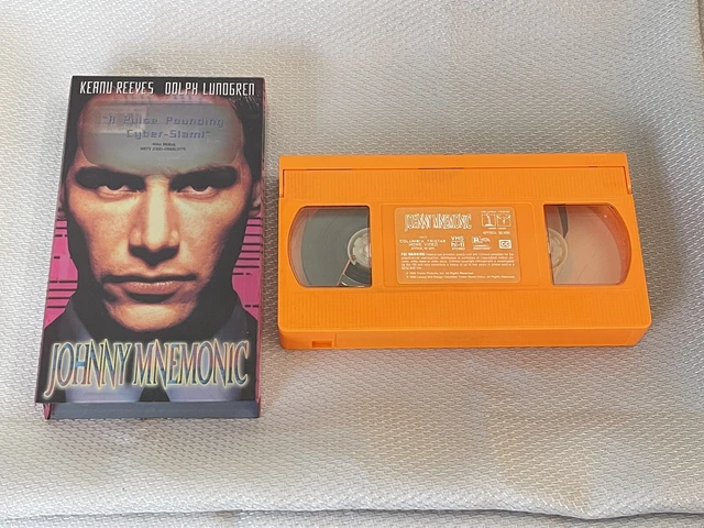 Johnny Mnemonic VHS Orange Video Cassette Tape Keanu Reeves 1995 w/ Slipcover Johnny Mnemonic VHS Orange Video Cassette Tape Keanu Reeves 1995 w/ Slipcover
