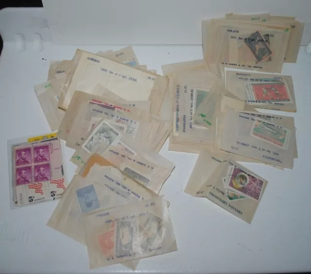 Large lot of vintage postage stamps, mostly international H.E. Harris lots, READ