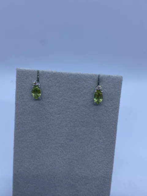 Orecchini in oro con diamanti ct.0.06 e Peridoto Ct.0.80