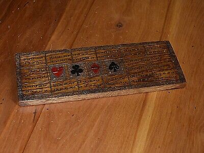 A Lovely Old Small Wooden Oak Cribbage Board With Hand Carved Card Suit Symbols