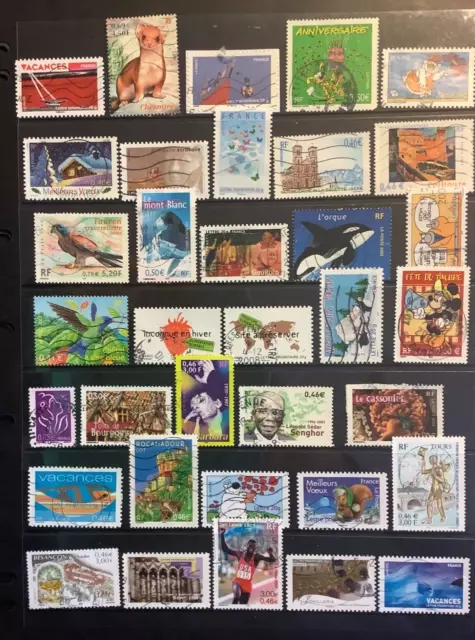 FRANCE....2 PAGE COLLECTION OF USED STAMPS - only Recent all different