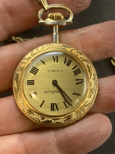 Andre rivalle pocket clearance watch gold