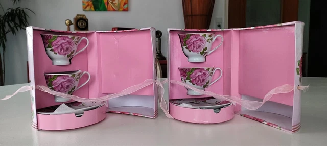 2 coffrets 4 tasses et soucoupes à motifs de rose - porcelaine - Années 80