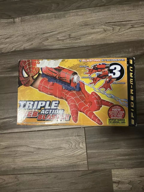 https://www.picclickimg.com/wpIAAOSwectkOu31/Spider-Man-2-Triple-Action-Web-Blaster-Toy.webp
