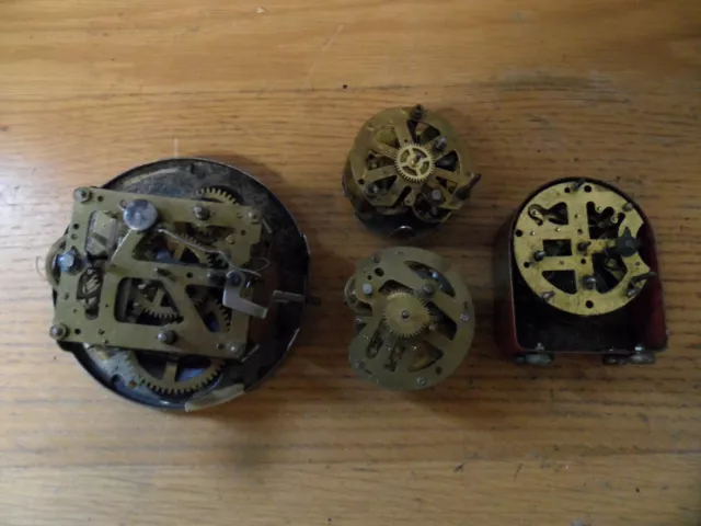 4 x Old Floating Balance Movements Inc 2 x Alarm Clocks