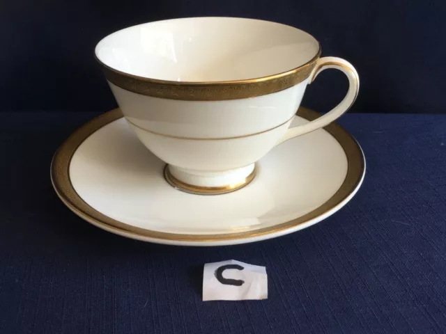 Royal Doulton Royal Gold tea cup & saucer ( very minor rim gilt wear ) C