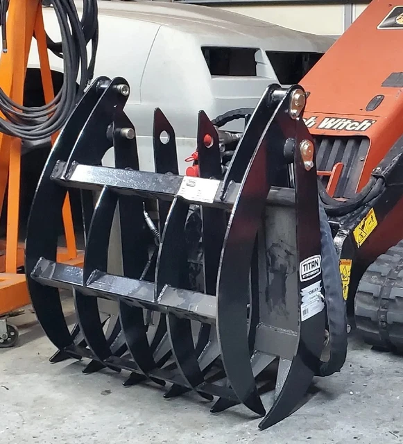 mini skid steer loader hydraulic rake grapple Ditch Witch Vermeer Boxer Toro