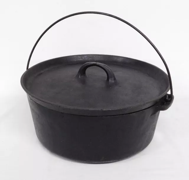 A large 10 quart Wagner Ware Cast Iron Kettle or Dutch Oven with flat lid