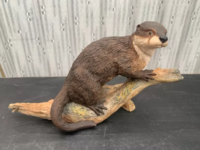 Early Border Fine Arts figurine of an Otter on a Branch by Judy Boyt 1981