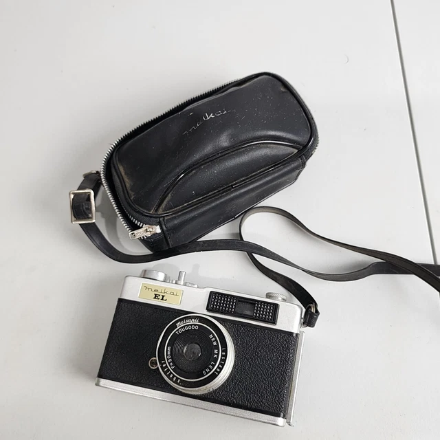 De colección años 60 Meikai EL Tougodo Cámara F 50 mm Lente 35 mm Película Estuche Negro Hecho en Japón