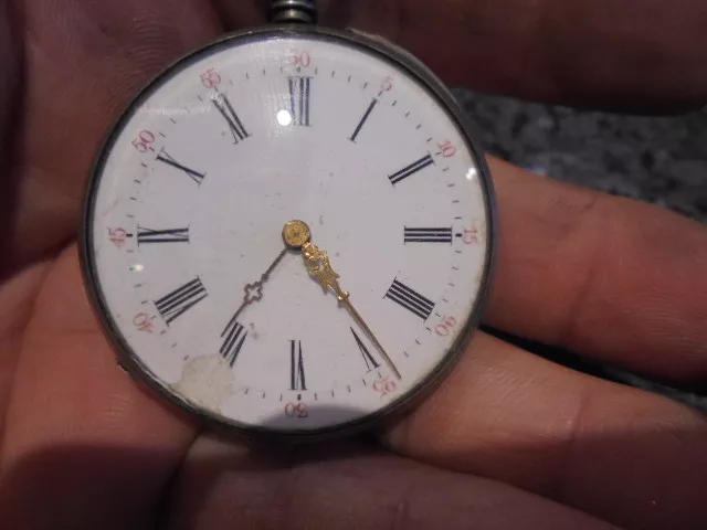 belle petite montre a gousset a clé en argent