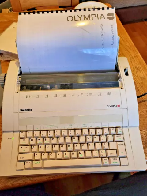 muy bonita Máquina de escribir electrónica OLYMPIA SPLENDID portátil hermano hacha + costilla de repuesto