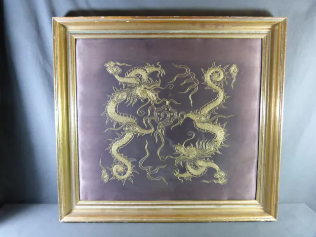 CHINA Gold thread embroidery on silk Two head-to-tail dragons, early 20th centur