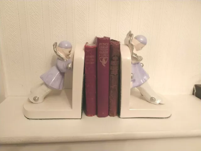 Pair Of Pierrot Bookends  Has Some Wear & Tear Please See Our Photos.