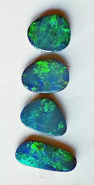 A parcel of four freeform shape Australian doublet opals