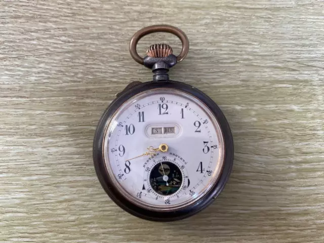 Montre a gousset ancienne à guichet et phase de lune mouvement mécanique