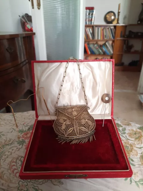 Borsa con borsa in filigrana floreale  con catena da polso e accessori