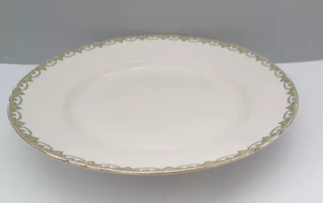 Plat rond 30cm ancien en porcelaine de Limoges frise vert et or