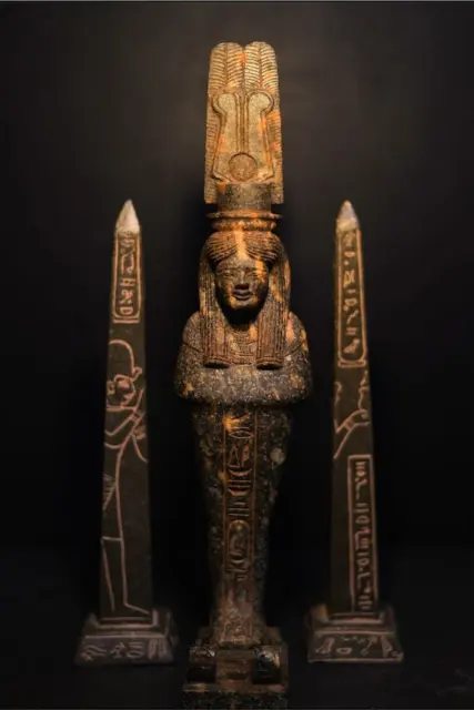 Egyptian goddess Isis statue wearing double feather of Amun Ra