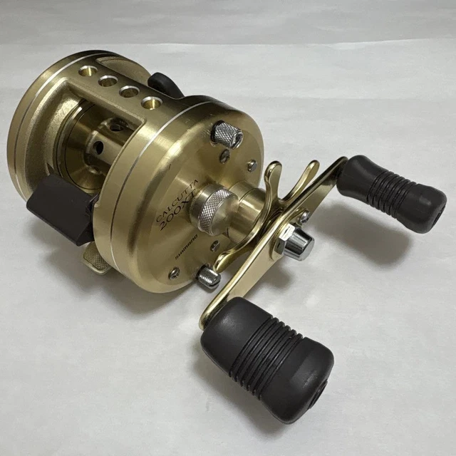 SHIMANO CALCUTTA 200XT ゴールド SHIMANO CALCUTTA 200XT Baitcasting Reel w/ Spare Handle Gold