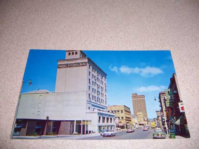 1960s MAIN STREET SCENE, DOWNTOWN AURORA IL. VTG POSTCARD