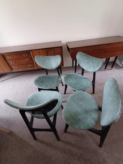 G Plan 1950's extendable dining table  and 4 matching butterfly chairs.