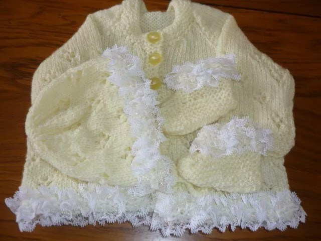 Handknitted baby cardigan hat and booties
