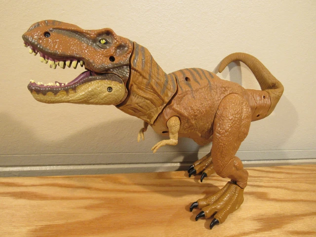 Jurassic World Stomp 'N Escape tyrannosaurus rex figure camp chalk dinosaur escape toy with stomping movements, movable joints, authentic decoration, kids gift ages 4 years