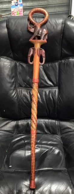 Walking Stick With Hand Carved Elephants on it.