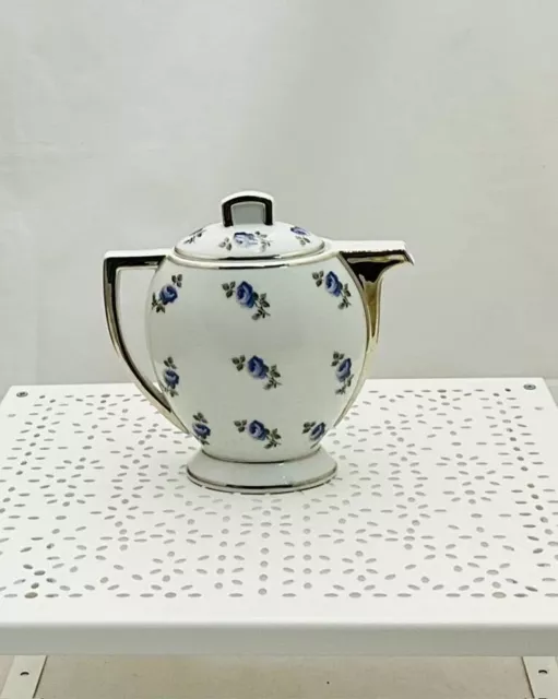 ancien pot à lait porcelaine blanche motifs fleurs bleues argent14 x 14,5 cm env