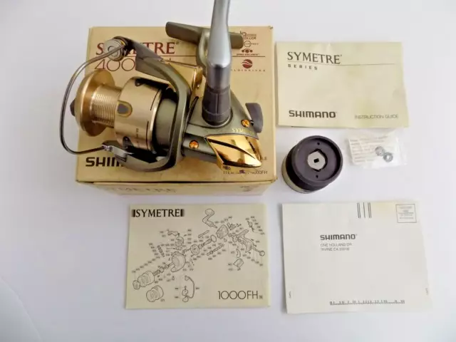 Two (2) Shimano Symetre 2000 FH Spinning Reels - With Spare Spool