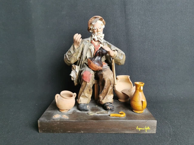 scultura in ceramica,firmato
