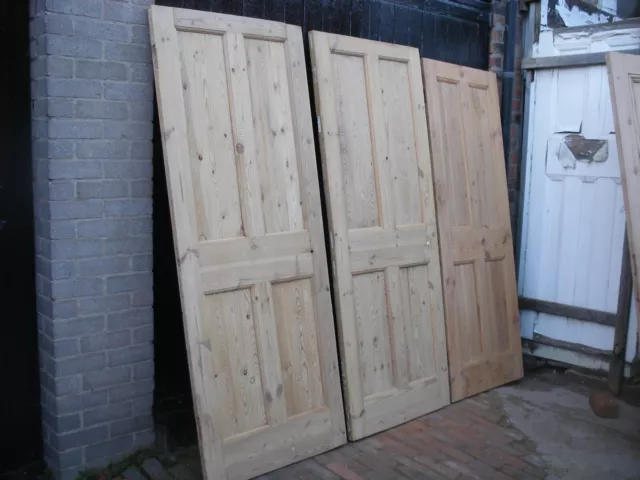 Reclaimed Edwardian or 1920s 4 panel stripped pine doors.  (6 available)