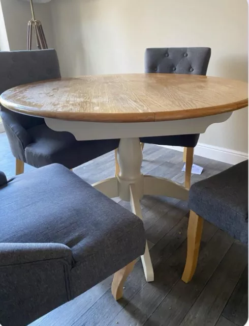 Round Extending Dining Table And 4 Upholstered Grey Chairs