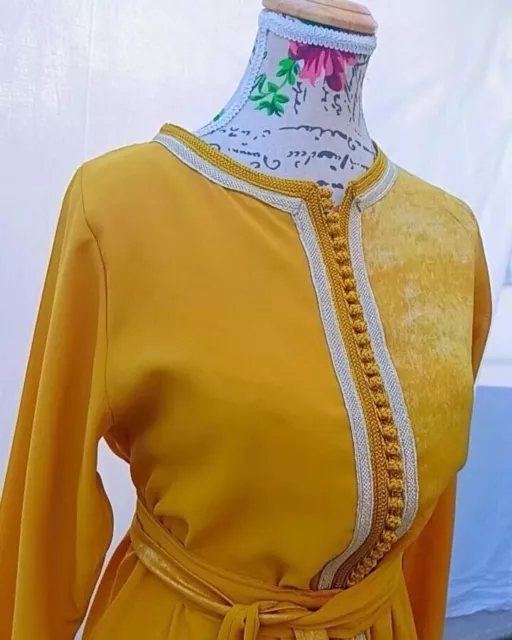 traditional handmade caftan shirt Moroccan craftsmanship embroidered gold women